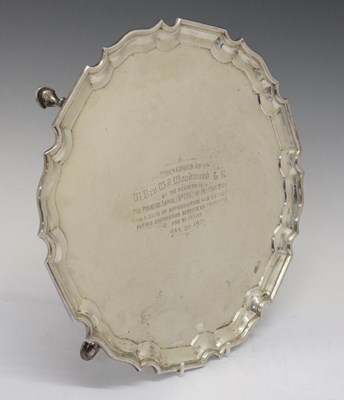 Lot 199 - George V silver shaped circular salver with piecrust border