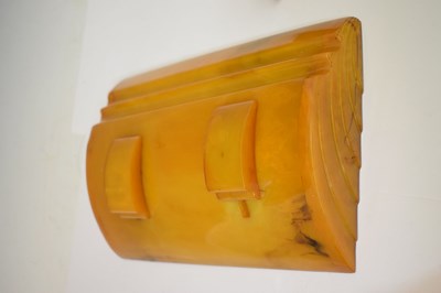 Lot 362 - Four Art Deco amber Bakelite desk items