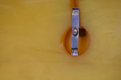 Lot 362 - Four Art Deco amber Bakelite desk items
