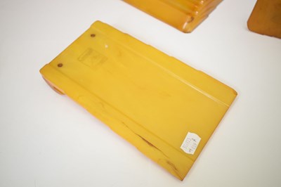 Lot 362 - Four Art Deco amber Bakelite desk items