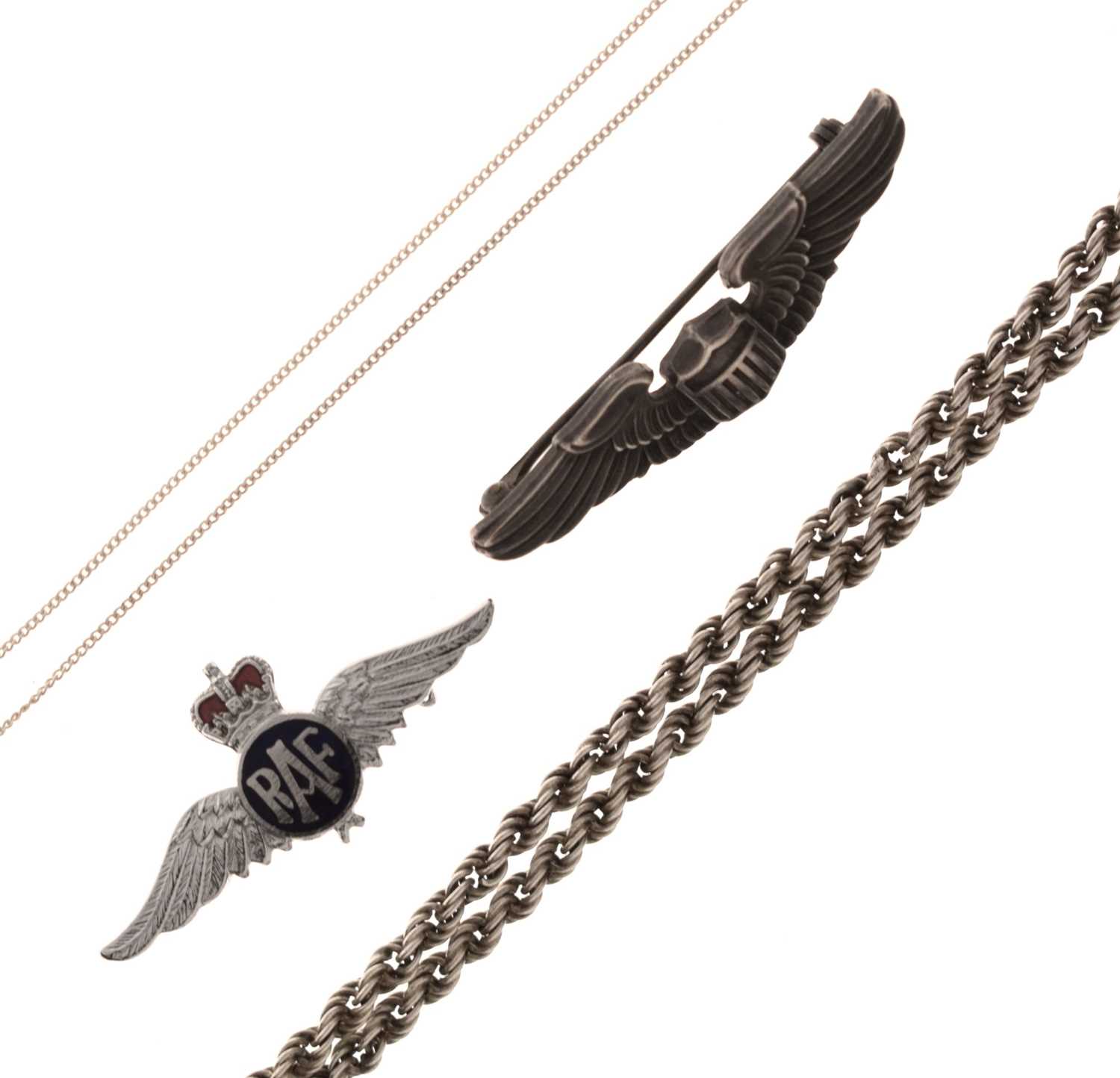 Lot 185 - American 'Amico' silver wings brooch, a RAF wings brooch, etc