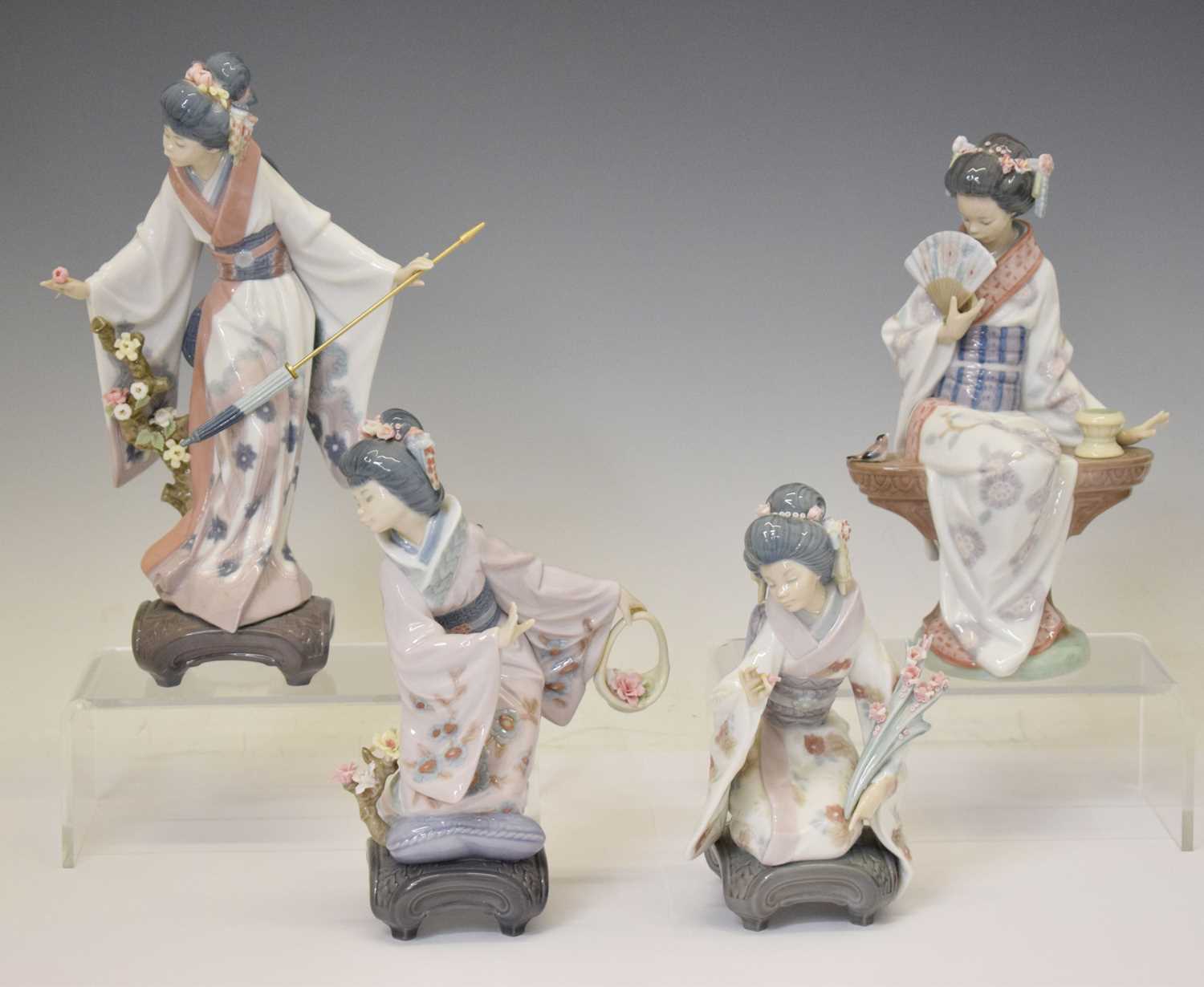 Lot 617 - Lladro - Group of four Japanese style figures