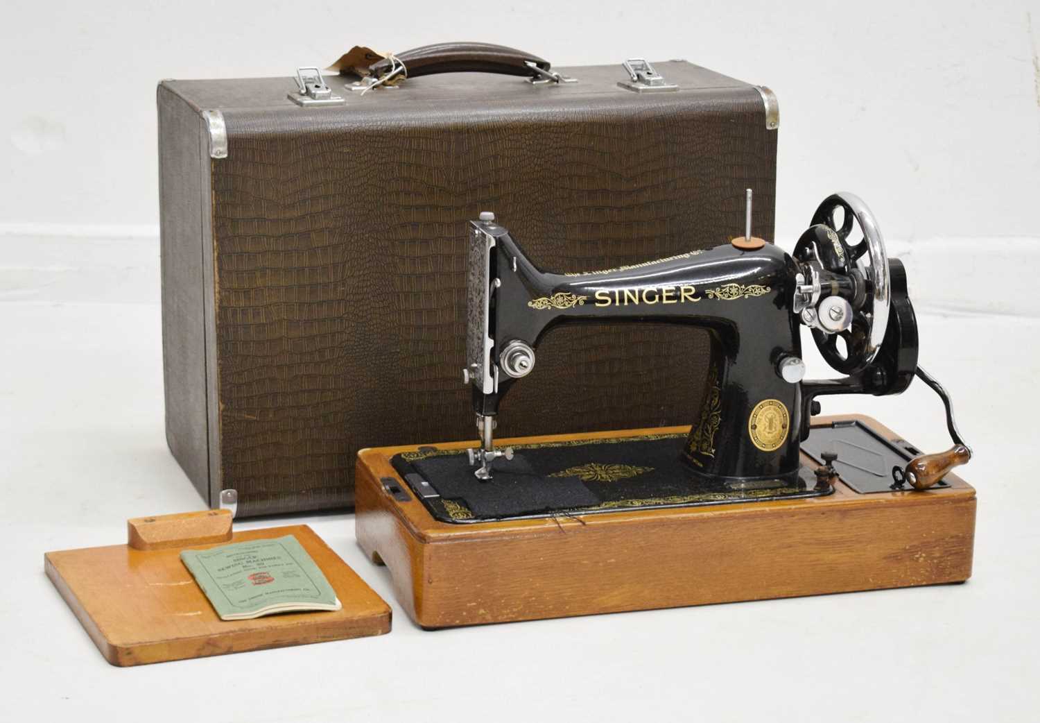 Lot 379 - Cased Singer sewing machine and case