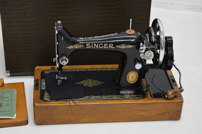 Lot 379 - Cased Singer sewing machine and case