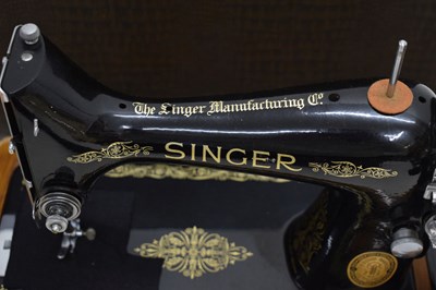 Lot 379 - Cased Singer sewing machine and case
