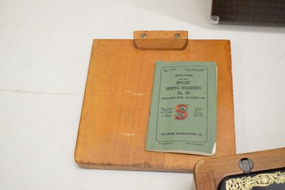 Lot 379 - Cased Singer sewing machine and case