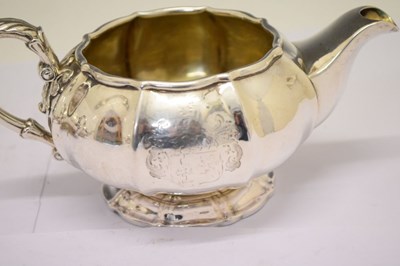 Lot 172 - George IV silver three-piece silver tea set of melon-shaped form