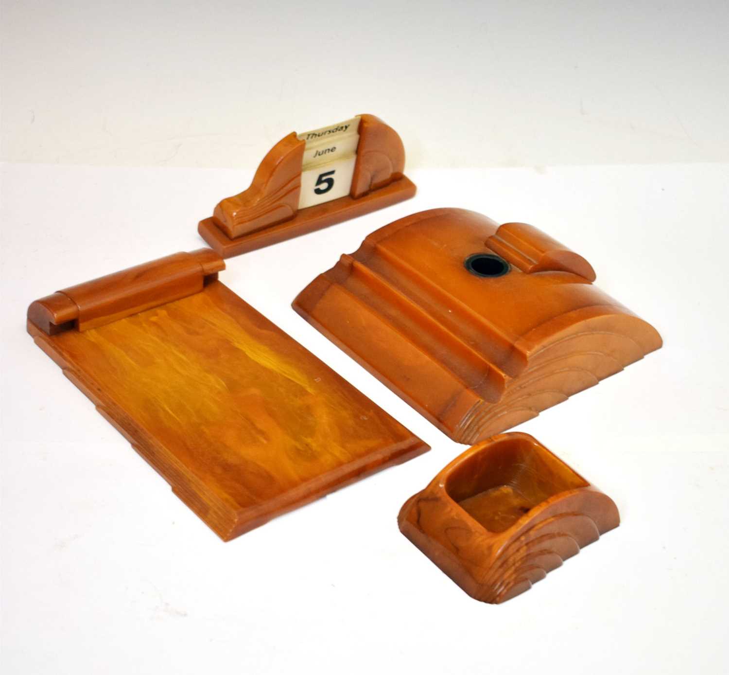 Lot 361 - Art Deco amber bakelite desk accessories