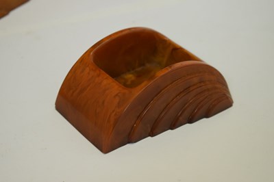 Lot 361 - Art Deco amber bakelite desk accessories