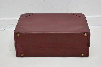 Lot 425 - Laurence Torino Italian claret-coloured leather suitcase