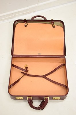 Lot 425 - Laurence Torino Italian claret-coloured leather suitcase