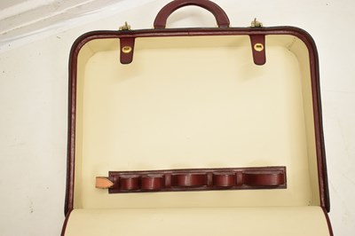 Lot 425 - Laurence Torino Italian claret-coloured leather suitcase