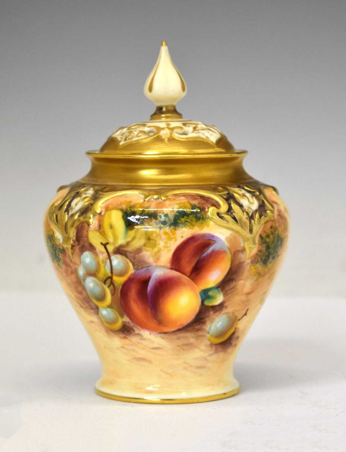 Lot 226 - Royal Worcester - Porcelain fruit painted baluster pot pourri vase
