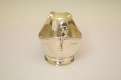Lot 304 - George VI silver sauce boat with flying scroll handle