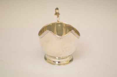 Lot 304 - George VI silver sauce boat with flying scroll handle