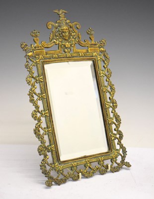 Lot 482 - Small cast brass wall mirror