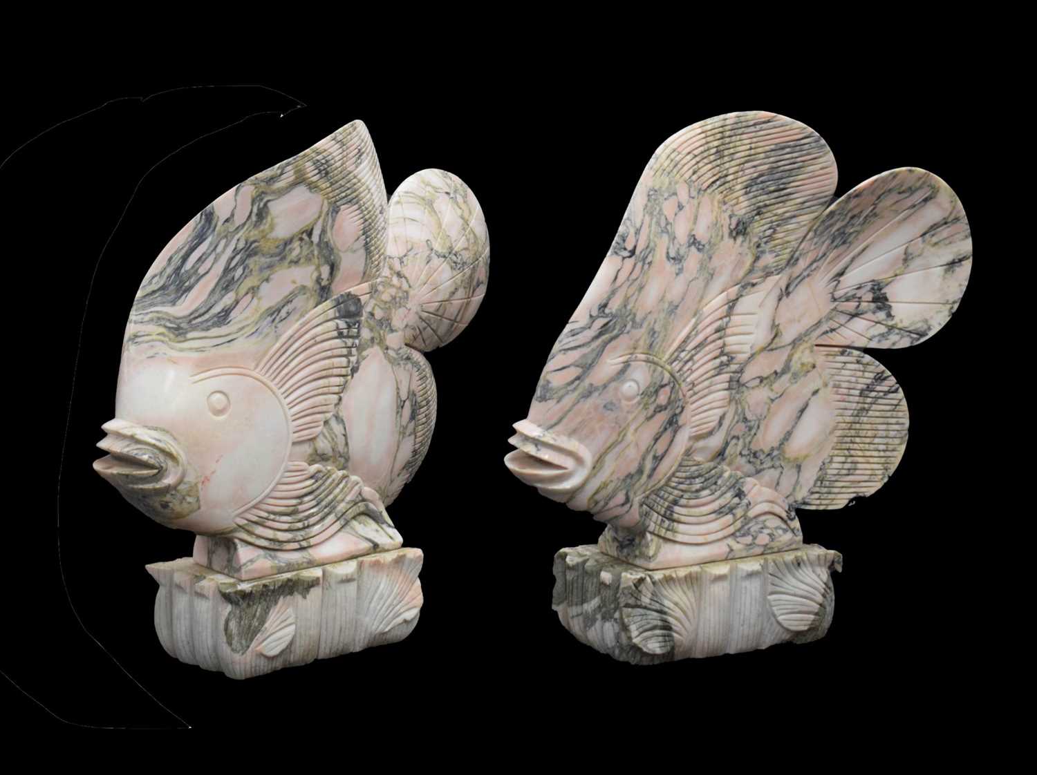 Lot 438 - Large pair of Art Deco style carved veined pink marble models of tropical fish