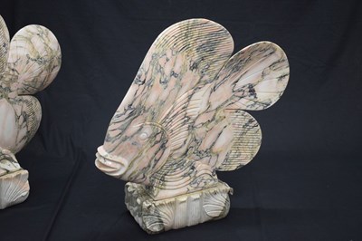 Lot 438 - Large pair of Art Deco style carved veined pink marble models of tropical fish