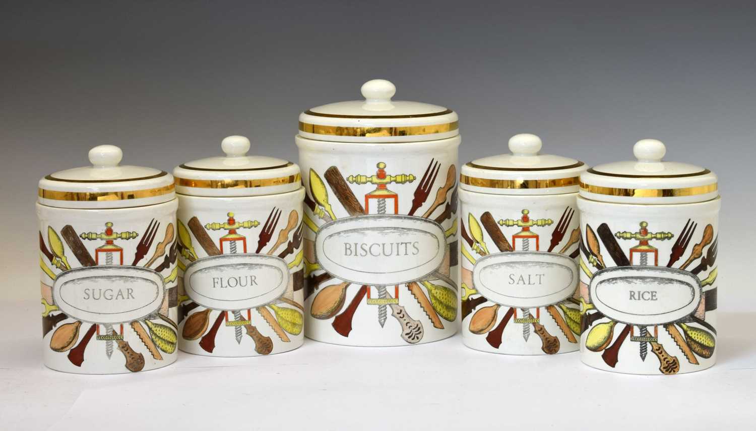 Lot 351 - Piero Fornasetti (Italian, 1913-1988) - Large ceramic cylindrical storage jar and cover, etc