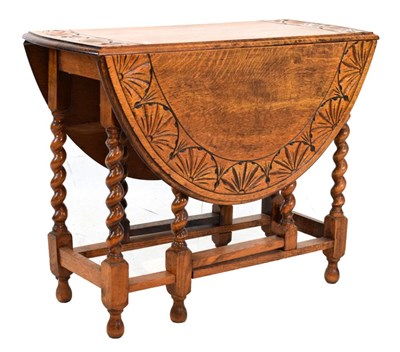 Lot 617 - Oak gateleg table with carved frieze to top