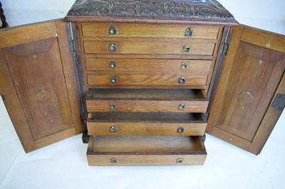 Lot 516 - Victorian carved oak specimen chest
