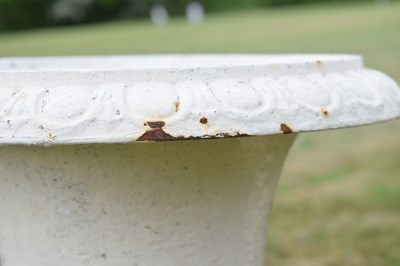 Lot 210 - Pair of white-painted cast iron garden urns