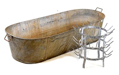 Lot 718 - Galvanised tin bath (132cm x 52cm x 31cm high) together with bottle dryer stand