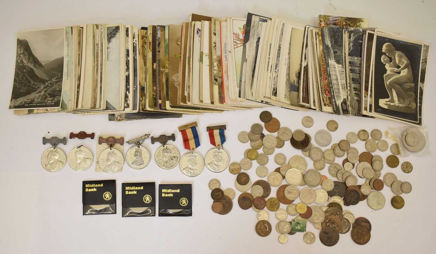 Lot 390 - Early 20th century and later postcards to include Titanic, a small quantity of coinage