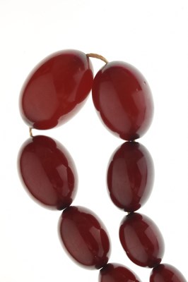 Lot 124 - Cherry bakelite amber beads