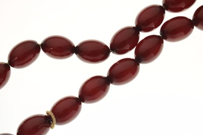 Lot 124 - Cherry bakelite amber beads