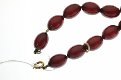 Lot 124 - Cherry bakelite amber beads