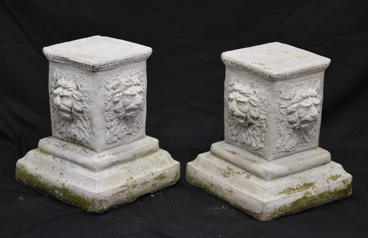 Lot 122 - Pair of composition garden pedestals or stands with lion masks