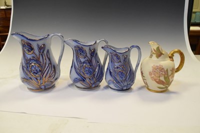 Lot 347 - Royal Worcester flatback jug and graduated set of three Victorian relief-moulded jugs