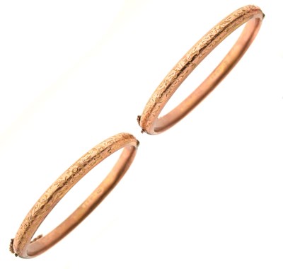 Lot 103 - Pair of 9ct rose gold snap bangles