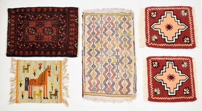 Lot 520 - Five small rugs and mats