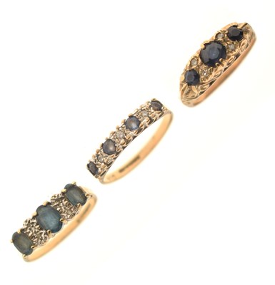 Lot 37 - Three late 20th century 9ct gold dress rings comprising a three-stone sapphire and diamond ring, etc