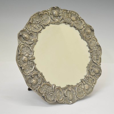 Lot 199 - Edward VII silver mounted circular easel mirror with foliate decoration