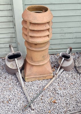 Lot 568 - Terracotta chimney crown and two galvanised Haws long spout watering can