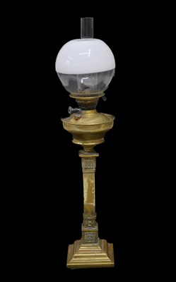 Lot 285 - Early 20th century brass column oil / paraffin lamp