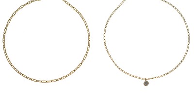 Lot 93 - Two yellow metal chains, each stamped '750', and a 9ct gold single white stone pendant