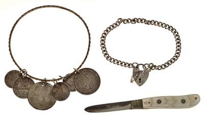 Lot 122 - Silver coin bracelet, silver curb link bracelet, and a folding fruit knife