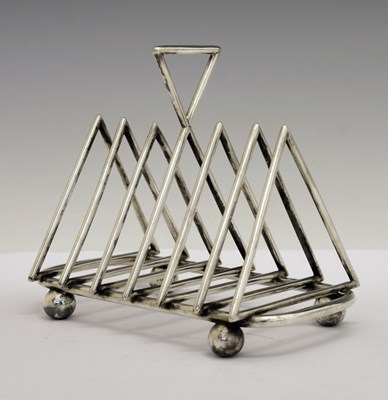 Lot Early 20th Century silver plated six division toast rack in the manner of Dr. Christopher Dresser