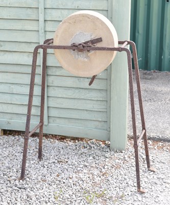 Lot 565 - Iron framed mill stone