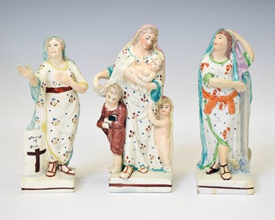 Lot 381 - Three Staffordshire pearlware figures, Faith, Hope and Charity