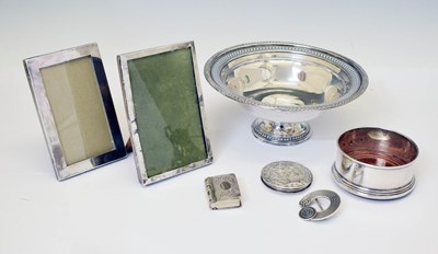 Lot 181 - White metal pedestal dish, George V photo frames, Elizabeth II silver wine coaster, etc