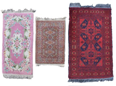 Lot 516 - Three wool rugs