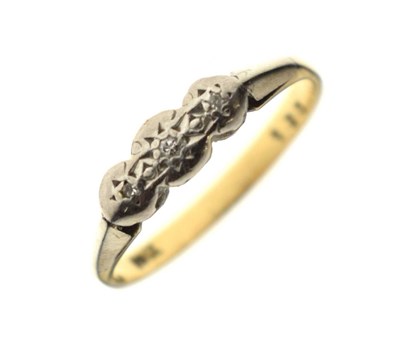 Lot 2 - Diamond three-stone ring, illusion set, stamped 18k