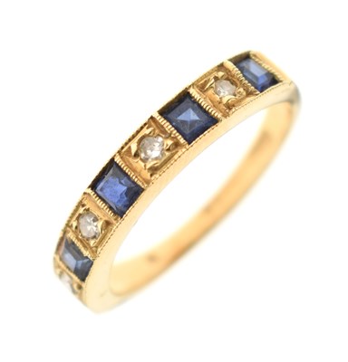 Lot 25 - Sapphire and diamond 18ct gold half eternity ring