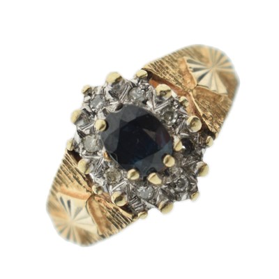 Lot 24 - Sapphire and diamond 9ct gold dress ring