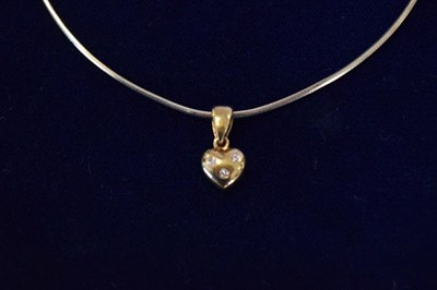 Lot 55 - 9ct diamond set heart pendant